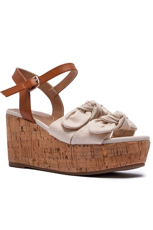 Beige linen wedge sandals with bow detail